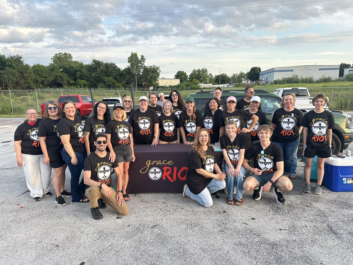 The graceRIOT team behind the ministry banner